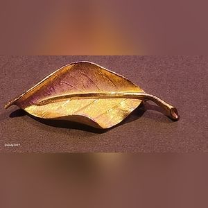 Leaf brooches